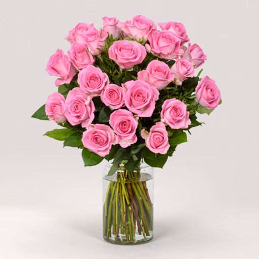 Individual pink roses with vase