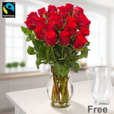 freshly tied Red Fairtrade roses in a bunch with vase