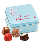 4 chocolates present "Herzlichen Glückwunsch"