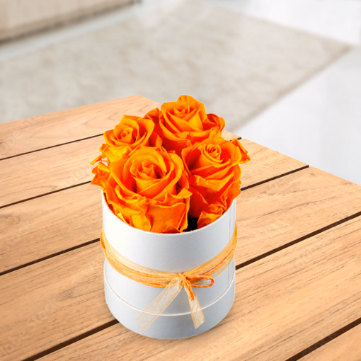 4 orange haltbare Rosen in Hutschachtel