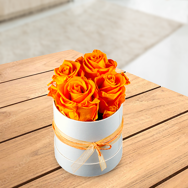 4 orange roses in a hat box