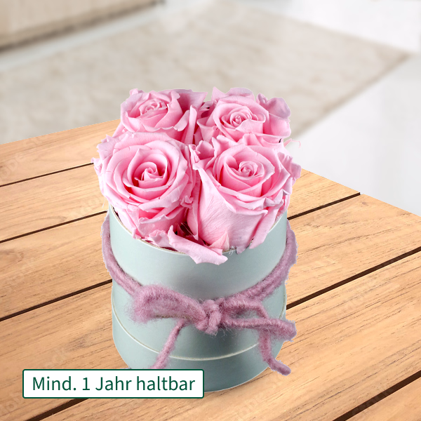 4 rosa haltbare Rosen in Hutschachtel