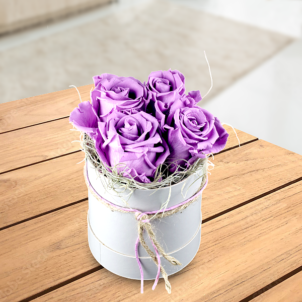4 lilac roses in a hat box