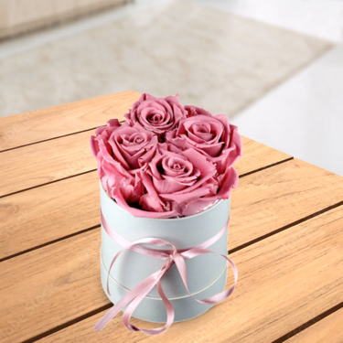 4 altrosafarbene haltbare Rosen in Hutschachtel