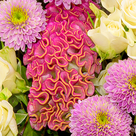 Premiumstrauß Blumensymphonie mit Premiumvase & Ferrero Raffaello