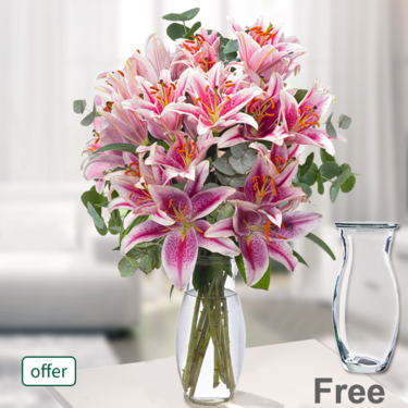 freshly tied 5 pink lilies with 3 eucalyptus in bunch with Vase
