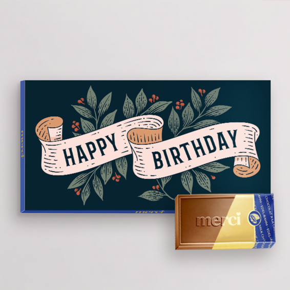 Merci mit Banderole „Happy Birthday“ (100 g)