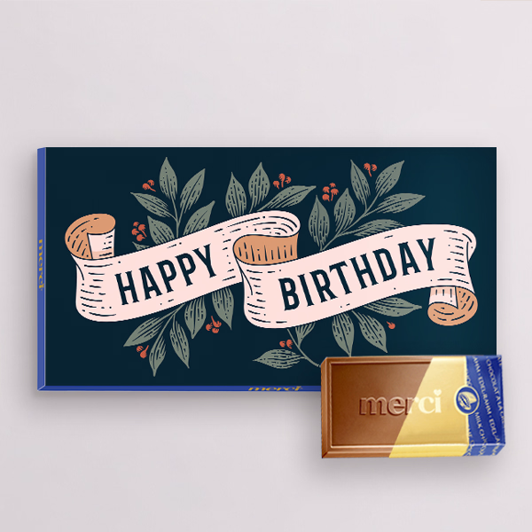 Merci mit Banderole „Happy Birthday“ (100 g)