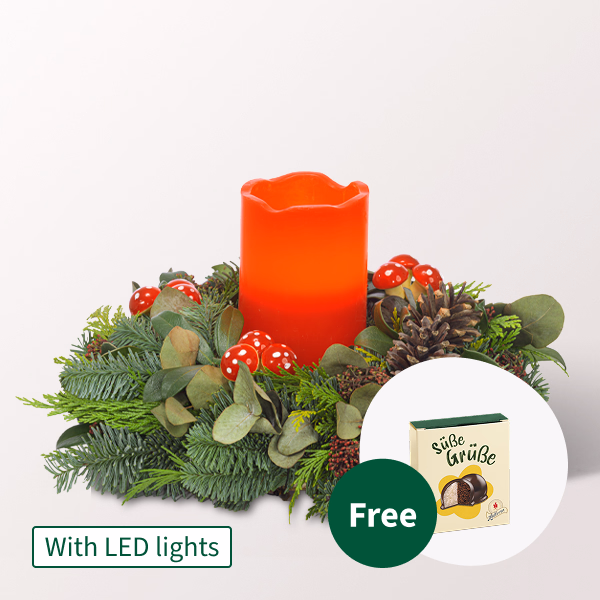 Arrangement with 1 red LED-Candle with Halloren Balls