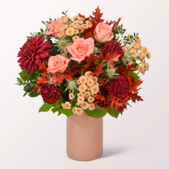 Premiumstrauß Sunrise mit Premiumvase & Halloren Kugeln