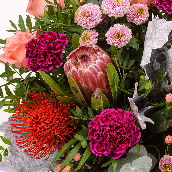 Premiumstrauß Abendsonne mit Premiumvase & Halloren Kugeln