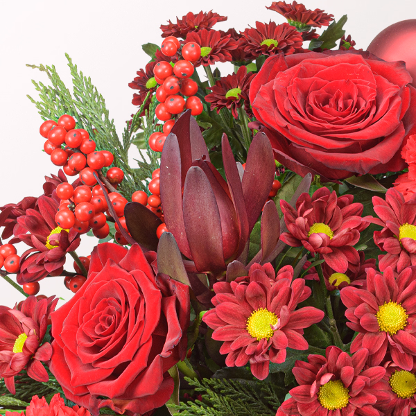 Premium Bouquet Weihnachtsüberraschung with Premium Vase & Halloren Balls